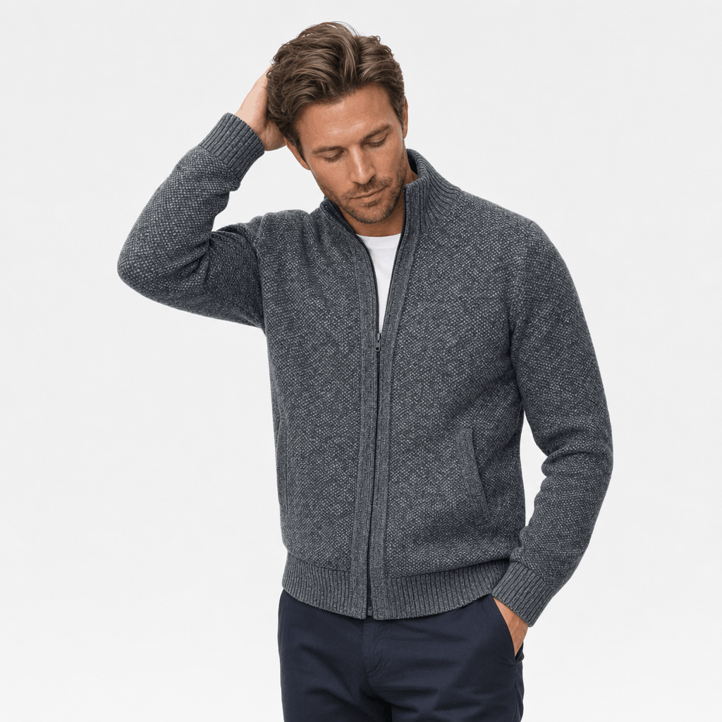 Male model wearing a charcoal gray textured zip-up jacket.