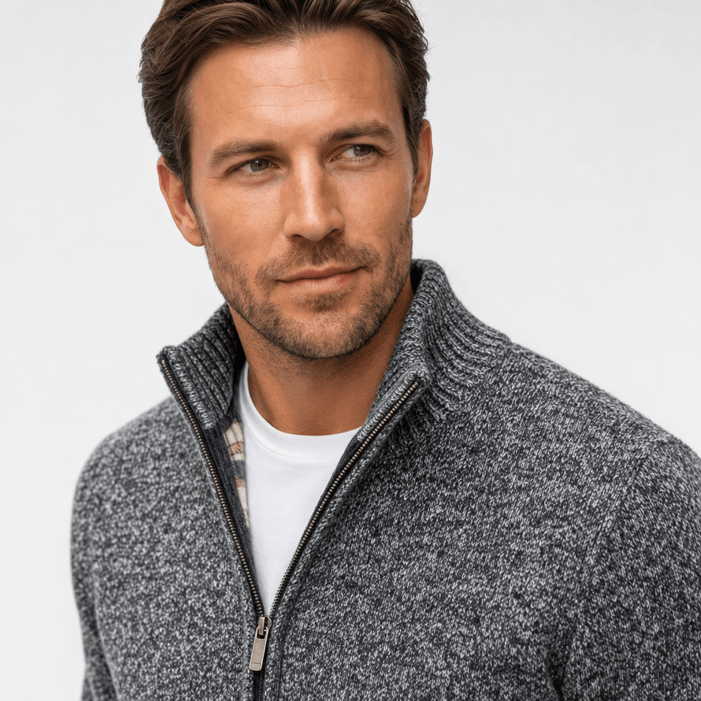 Detailed front view of the charcoal gray jacket, highlighting the stand collar and textured fabric.