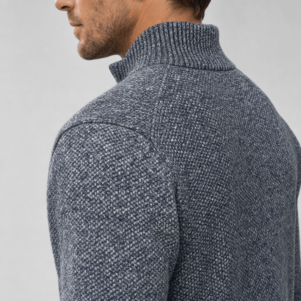 Close-up back view of the charcoal gray jacket, highlighting the collar and textured material.
