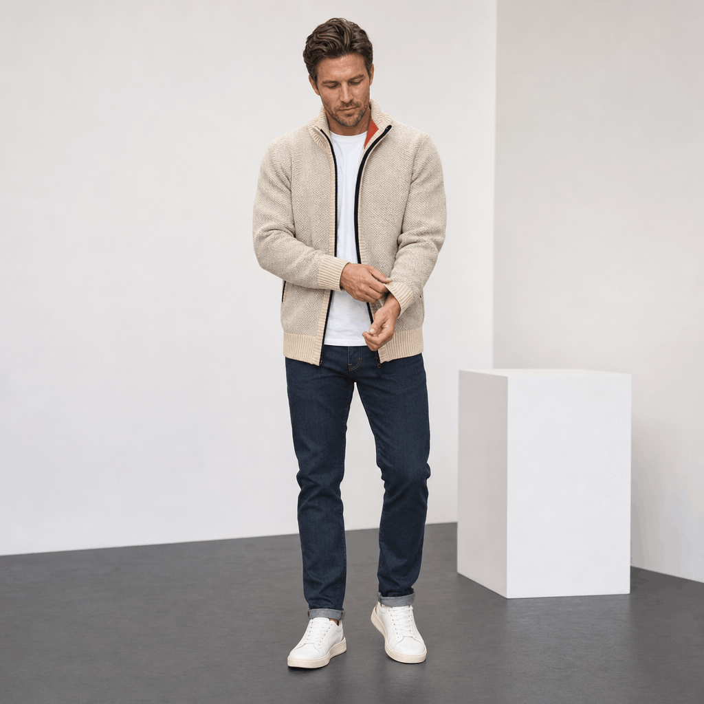Male model wearing the light beige jacket with dark pants.