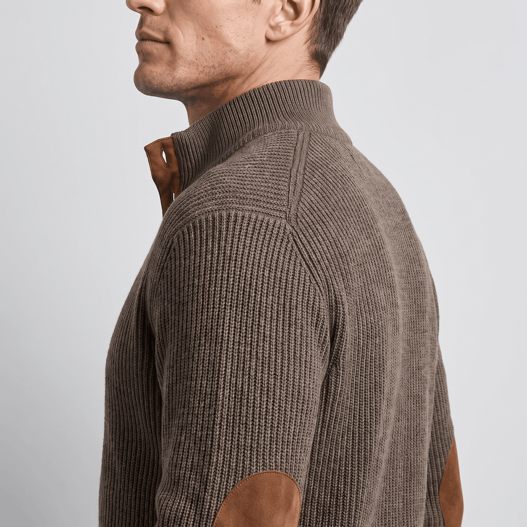 Brown ribbed knit henley sweater with a snap stand collar and contrasting suede elbow patches in a relaxed fit.