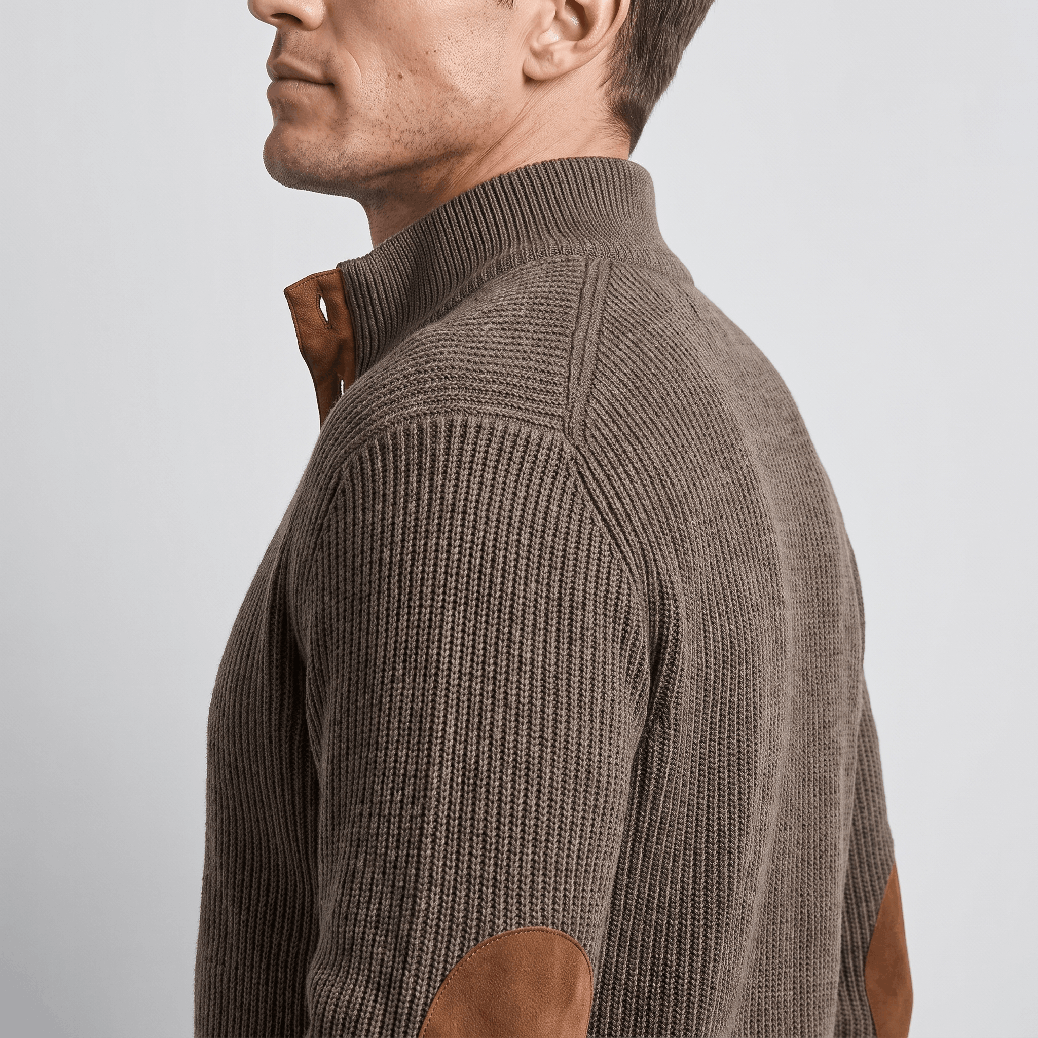 Brown ribbed knit henley sweater with a snap stand collar and contrasting suede elbow patches in a relaxed fit.