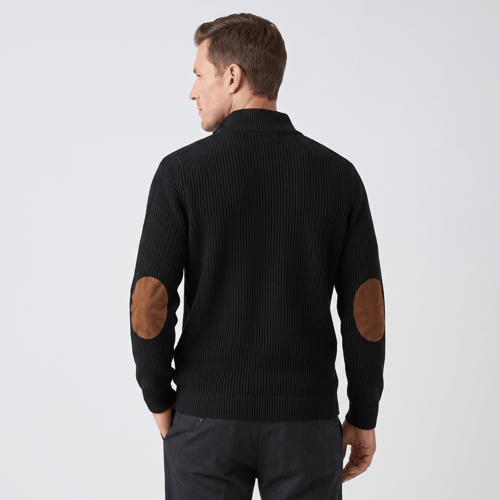 Black ribbed knit sweater with a stand collar and contrasting brown elbow patches, shown from the back.