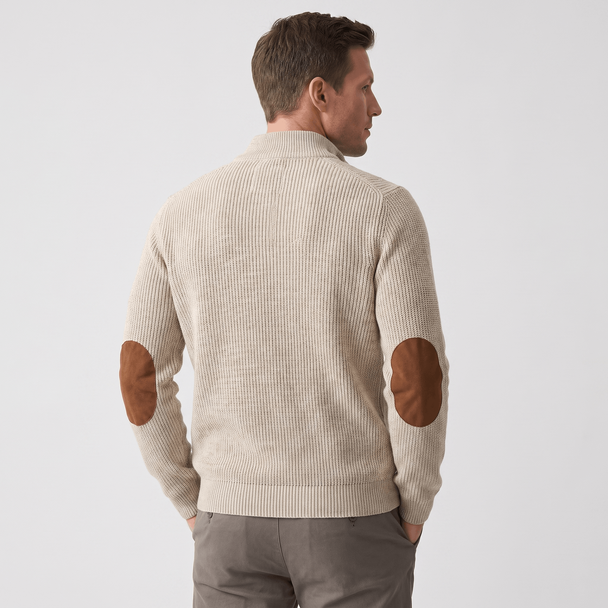 Beige vertical ribbed knit sweater with brown contrast elbow patches, stand collar, and relaxed fit.