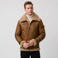 A man wearing a brown leather shearling bomber jacket with a sherpa collar and zip pockets