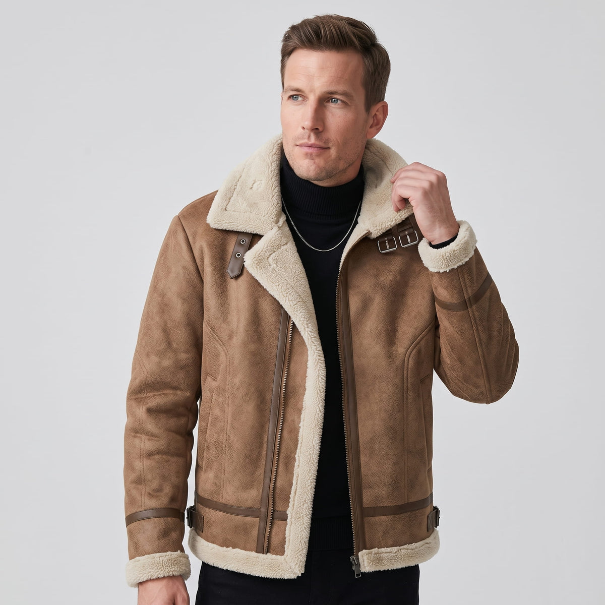 A man wearing a brown leather sherpa aviator jacket with fleece lining and zip pockets, adjusting the collar