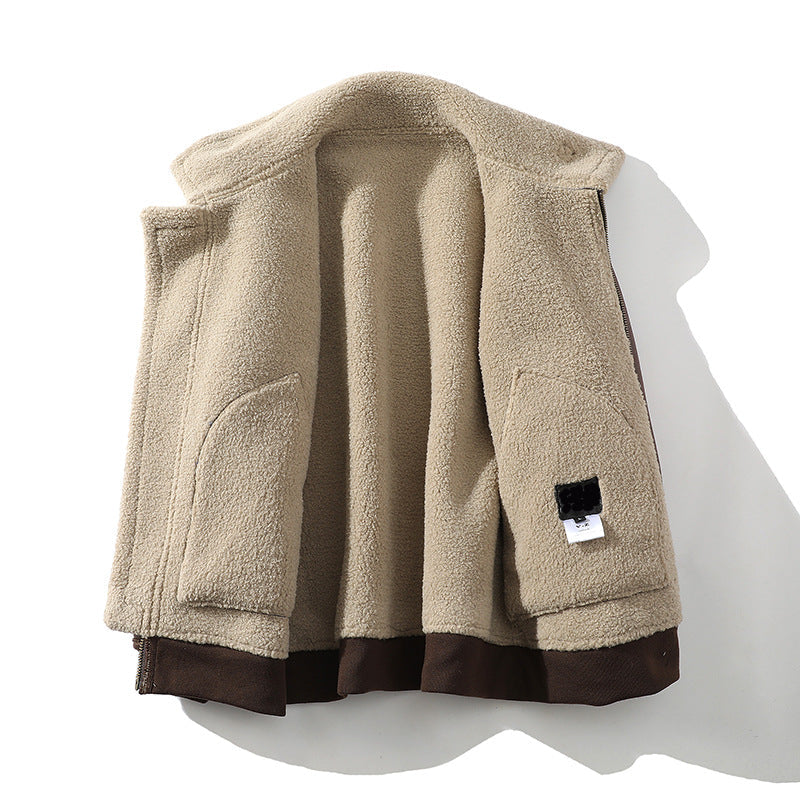 A beige sherpa-lined interior of a brown leather aviator jacket, showing the plush lining and collar