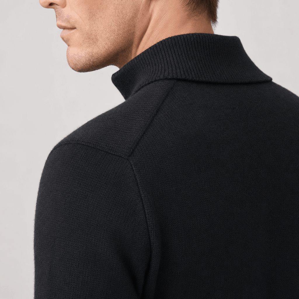 Back close-up showing the raised collar and textured knit of the black sweater.