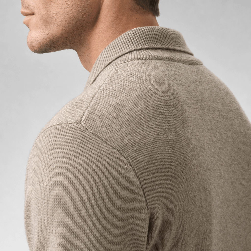 Side close-up showing the shoulder and knit texture of the light taupe sweater.