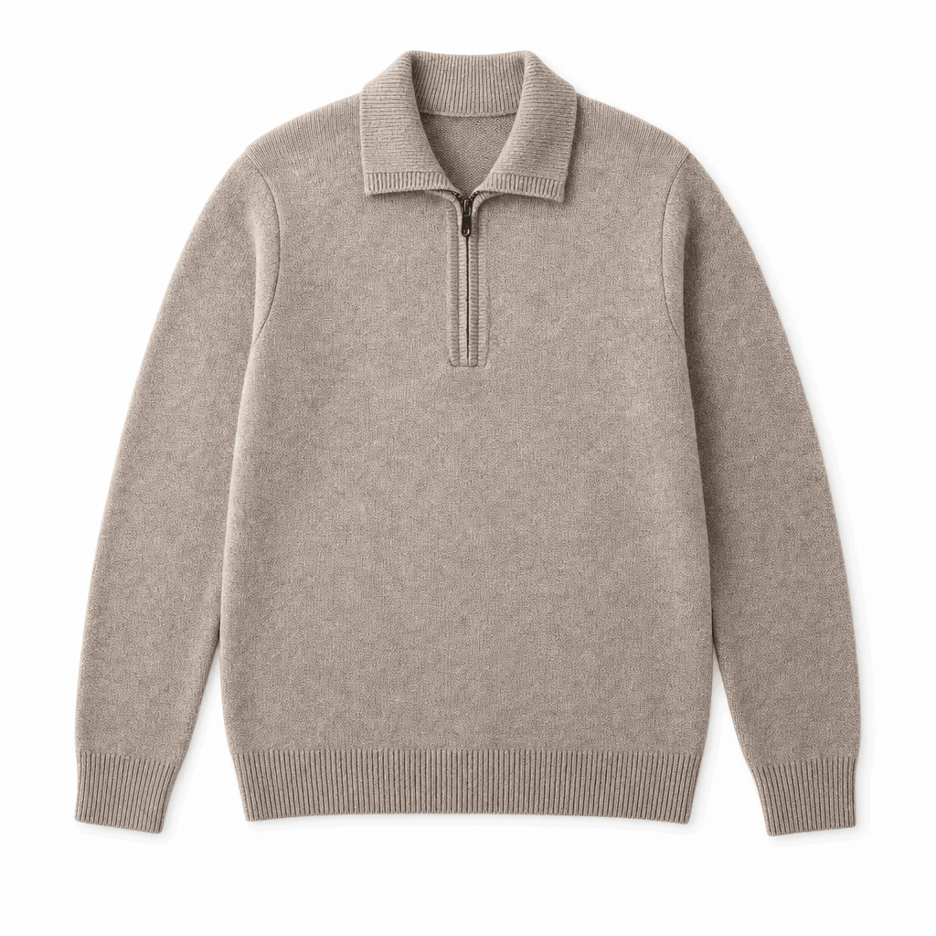 Light taupe textured half-zip sweater displayed on its own against a light background.