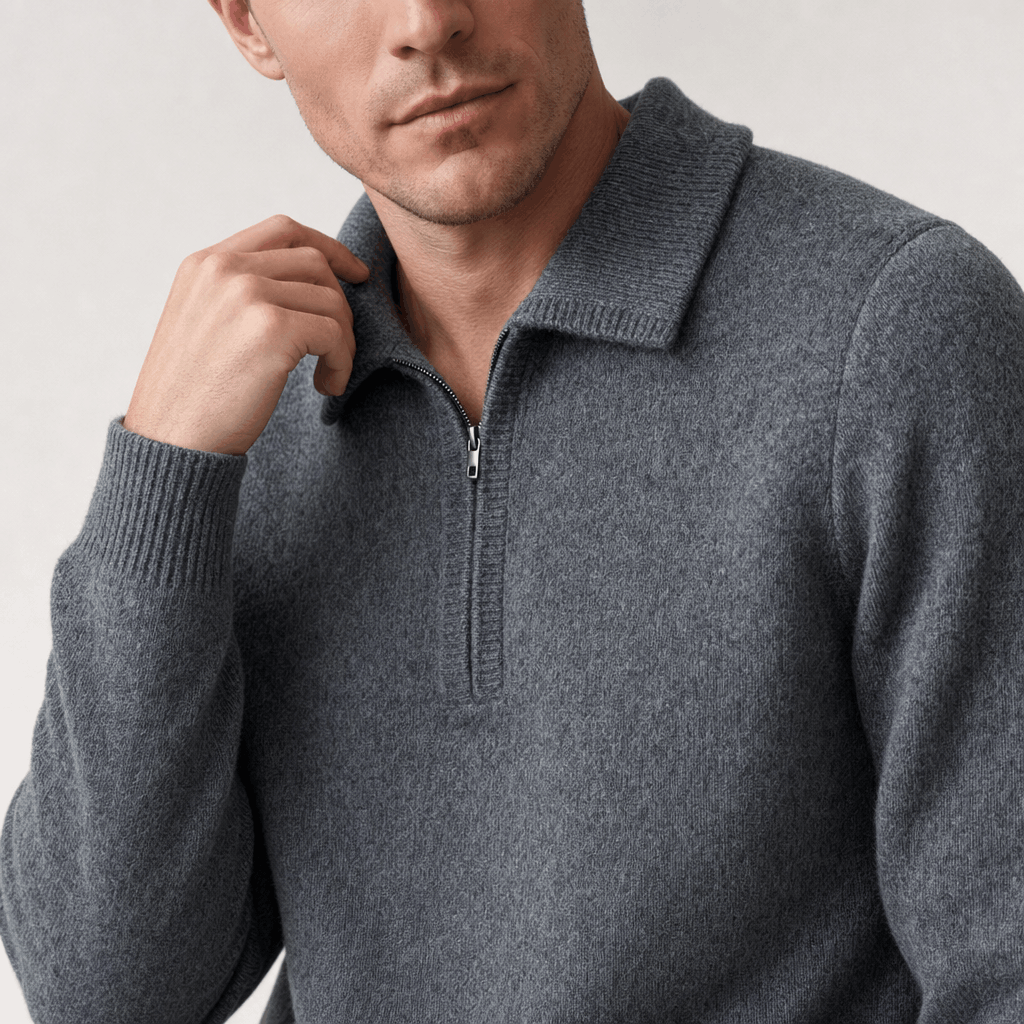 Close-up showing the collar and half-zip neckline of the charcoal gray sweater.
