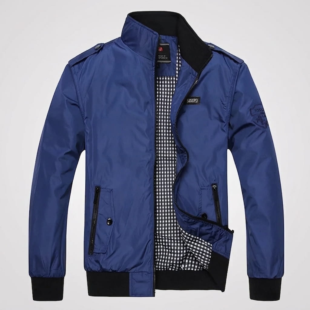 Navy blue bomber jacket displayed open, showing the dark patterned inner lining.