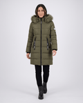 A woman wearing a long olive green parka jacket with an insulated design, hood, and full-zip front