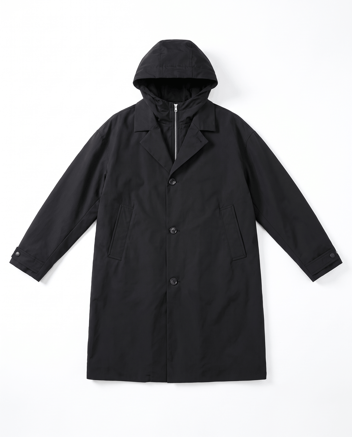 A black longline hooded trench coat with a weather-resistant design and full-length coverage, shown flat