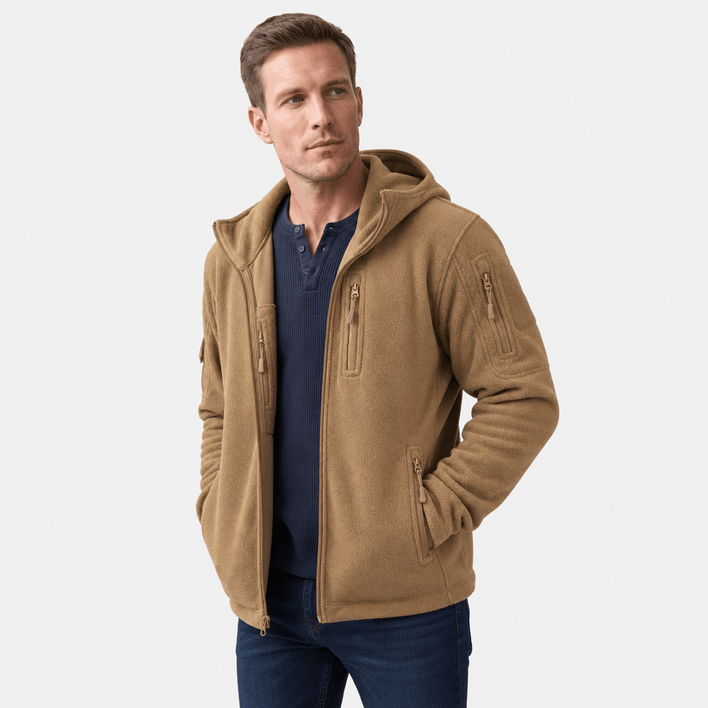 Male model wearing a tan hooded zip-up jacket.