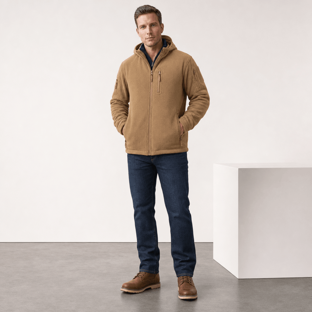 Male model wearing the tan hooded jacket with dark jeans.