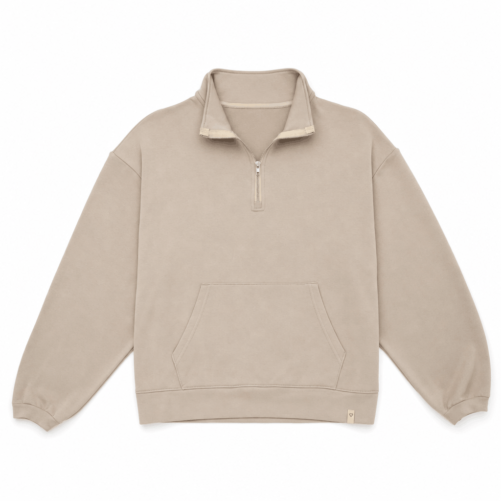 Flat product view of the light taupe quarter-zip sweater, showing the relaxed silhouette and long sleeves.