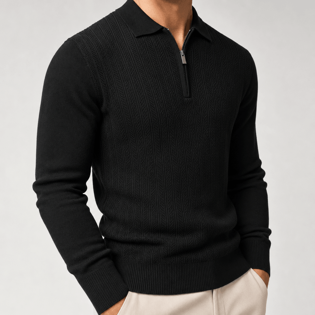 Black quarter-zip polo sweater featuring a textured openwork knit front, smooth sleeves, and a ribbed hem.