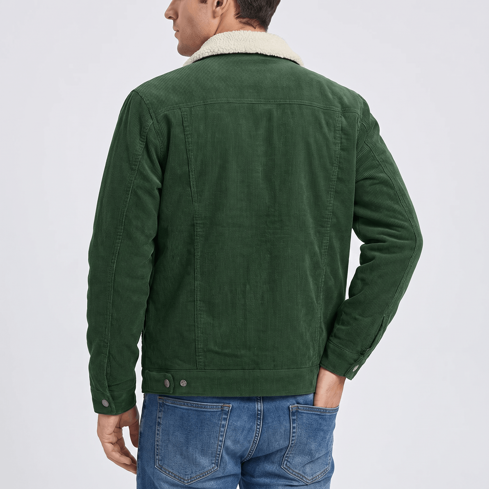Dark green cotton corduroy jacket with a cream sherpa collar, featuring a structured back yoke and buttoned cuffs.