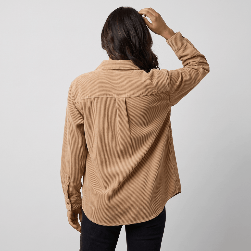 Beige fine wale corduroy button-down shirt with a relaxed fit, point collar, and back box pleat.