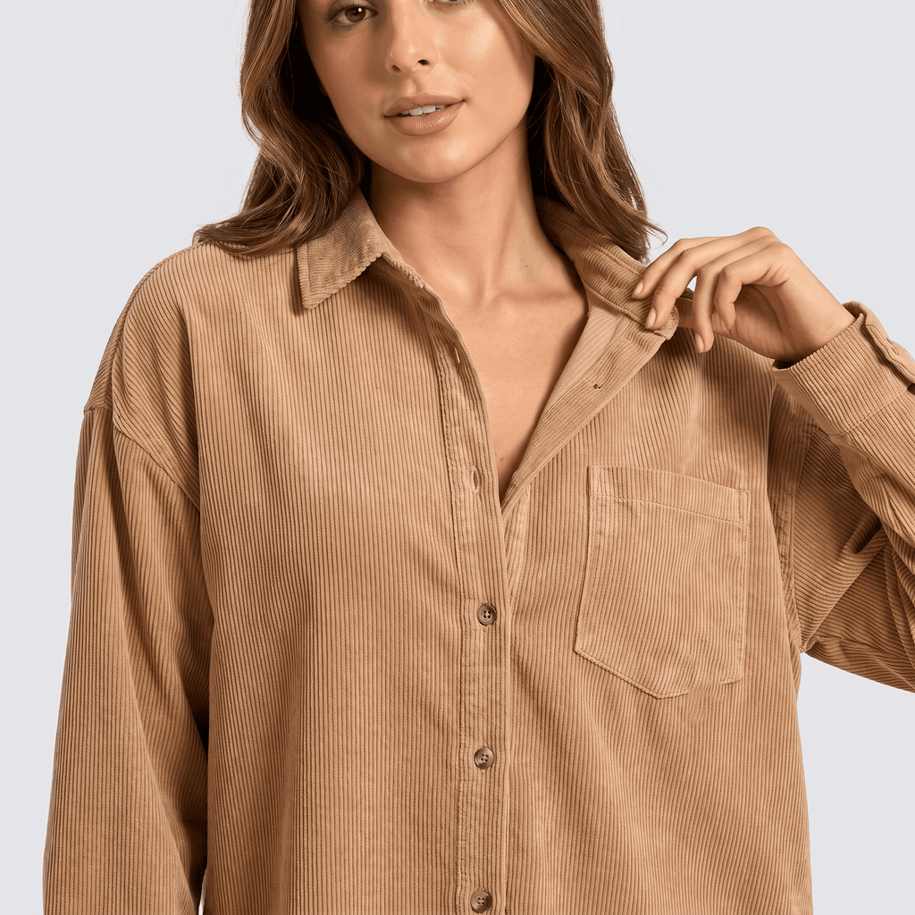 Beige fine wale corduroy button-down shirt with a relaxed fit, point collar, and chest pocket.