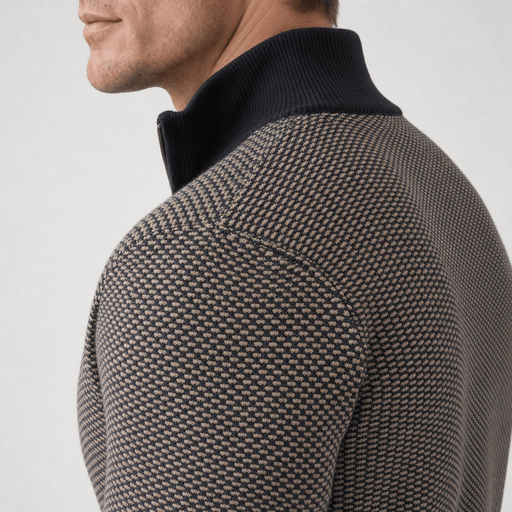 Side close-up showing the raised collar and textured knit pattern of the dark gray sweater.