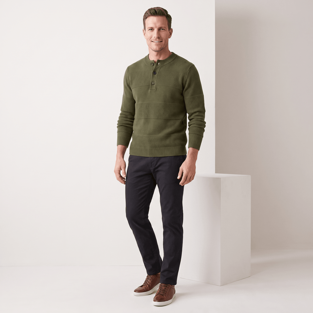 Olive green chunky knit henley sweater with textured horizontal stripes, three-button placket, and ribbed trim.