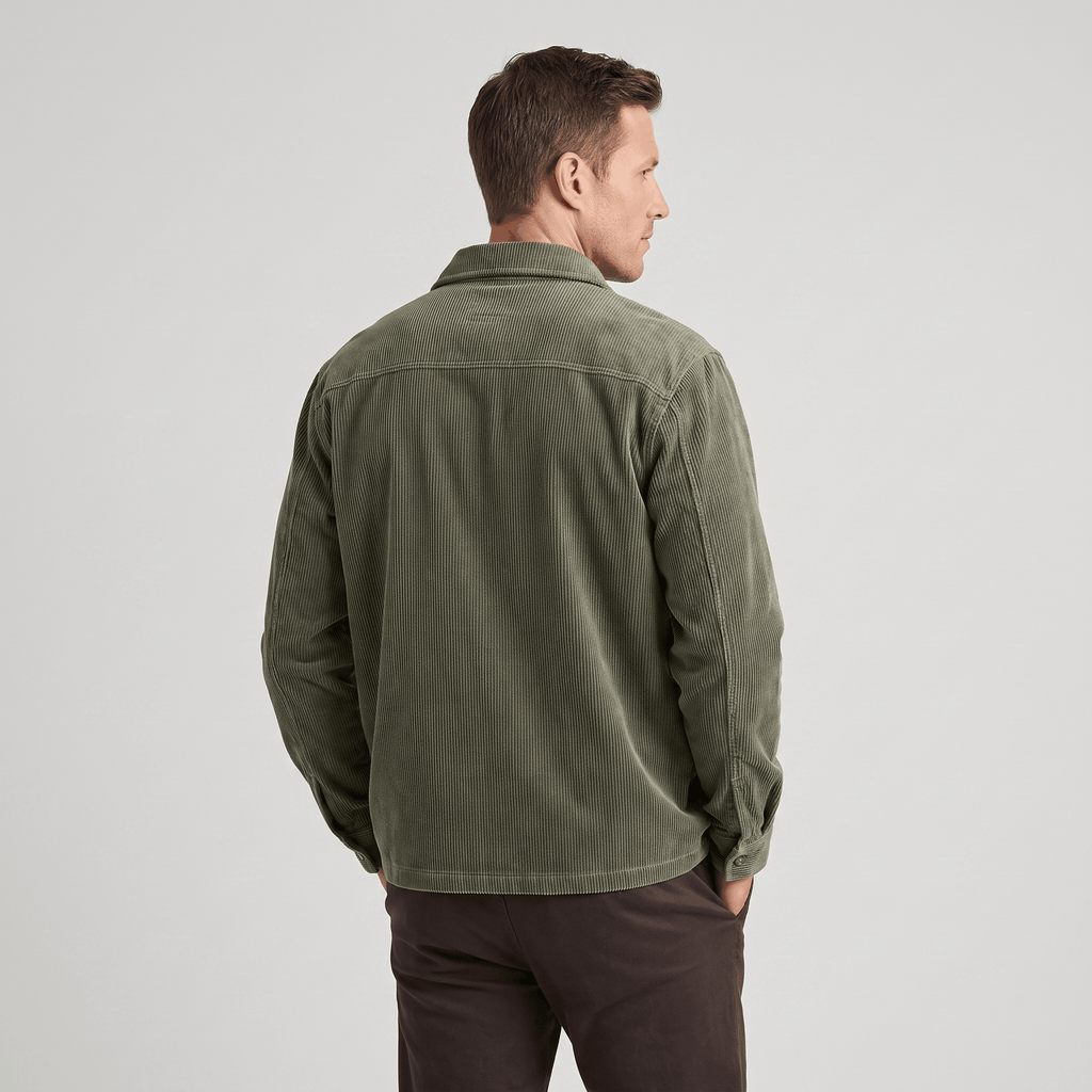 Olive green corduroy shirt jacket with a relaxed fit and soft, washed texture, shown from the back.