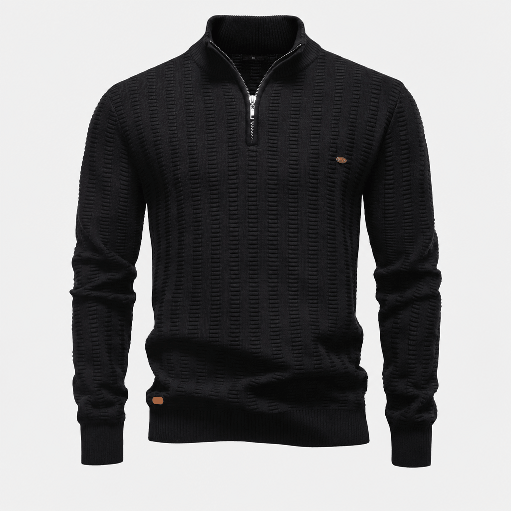 Black textured half-zip sweater displayed on its own against a light background.