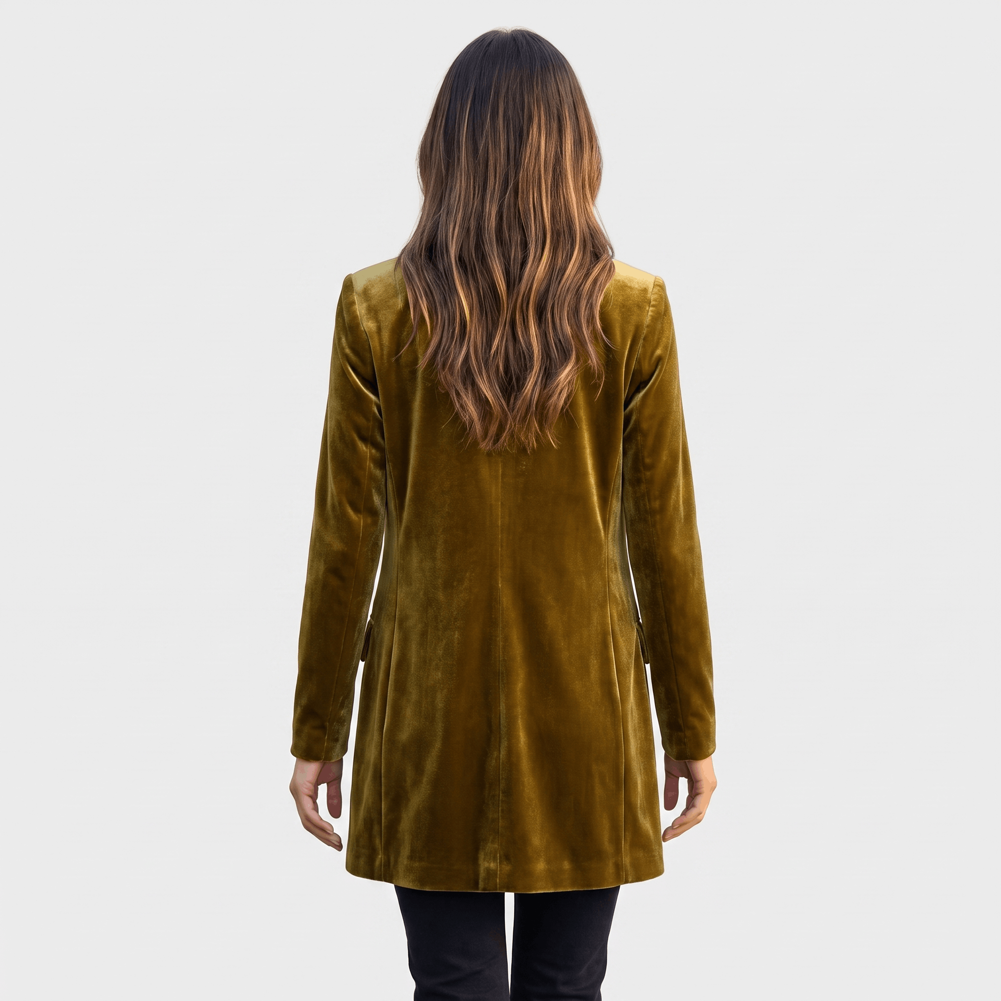 Female model wearing the mustard olive velvet blazer, showing the back and fitted silhouette.