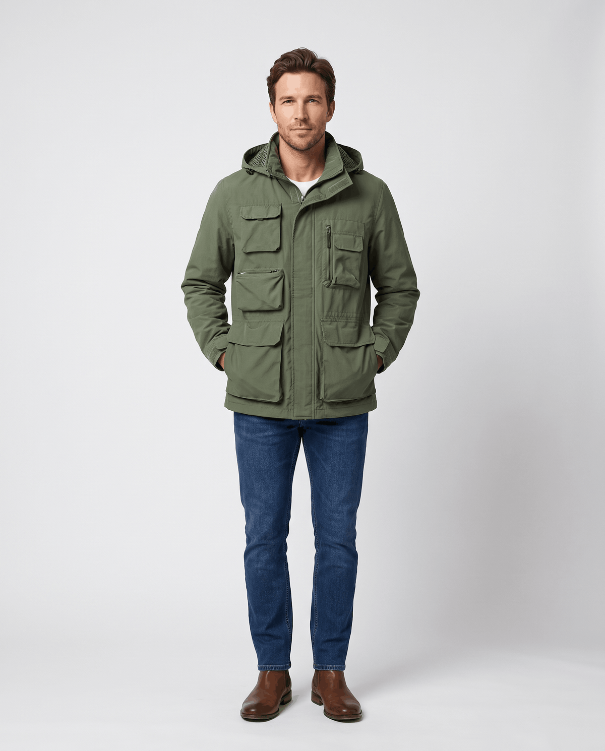 A man wearing a green hooded parka jacket with warm padded lining and multiple front pockets