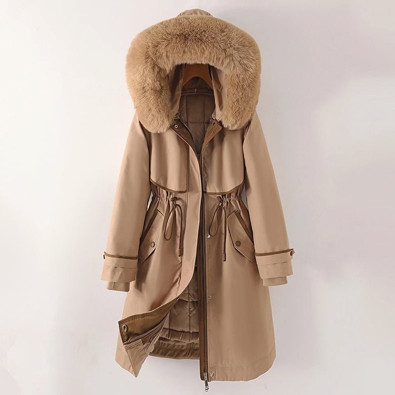 A beige winter parka with a plush fur-trimmed hood, cozy lining, and adjustable waist, shown flat