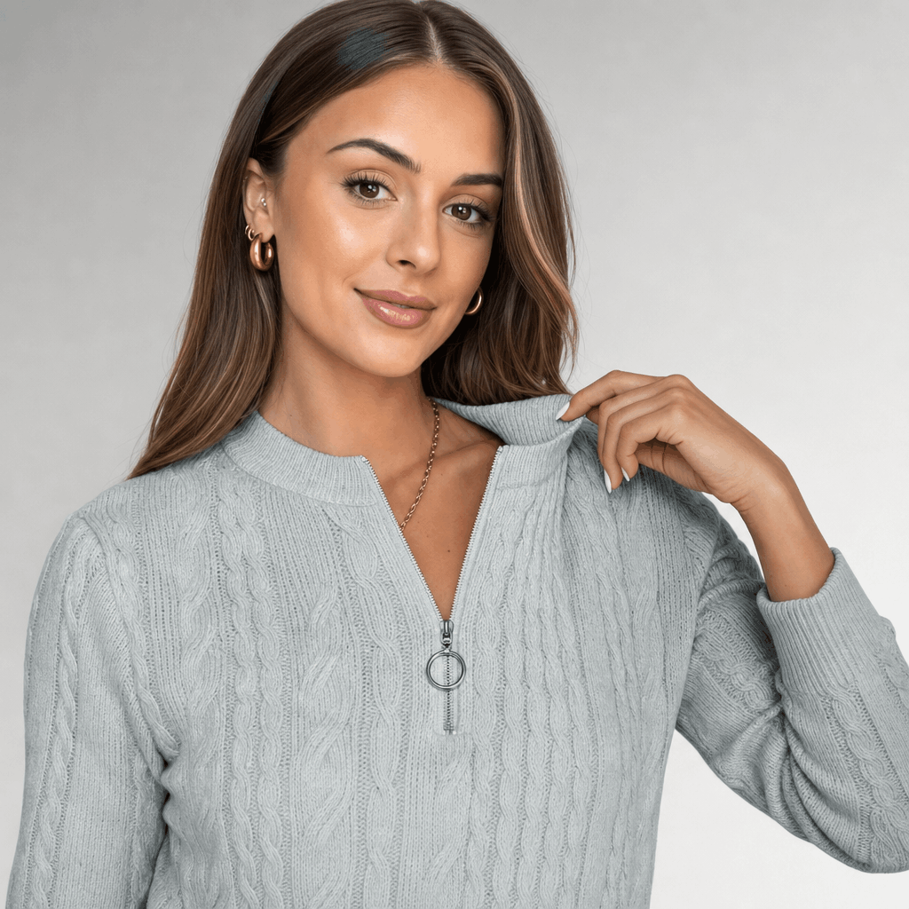Close-up of the woman modeling the light gray sweater.