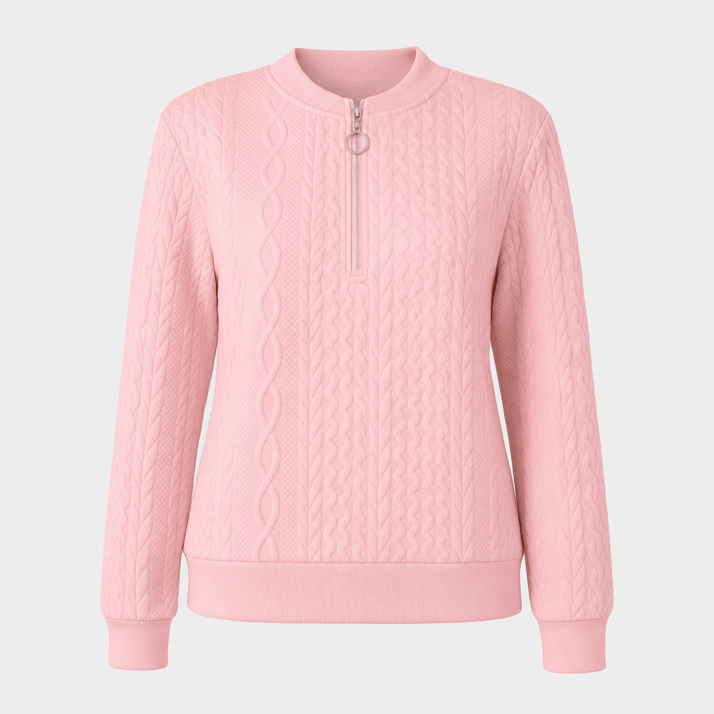 Soft pink ribbed half-zip sweater displayed on its own against a light background.