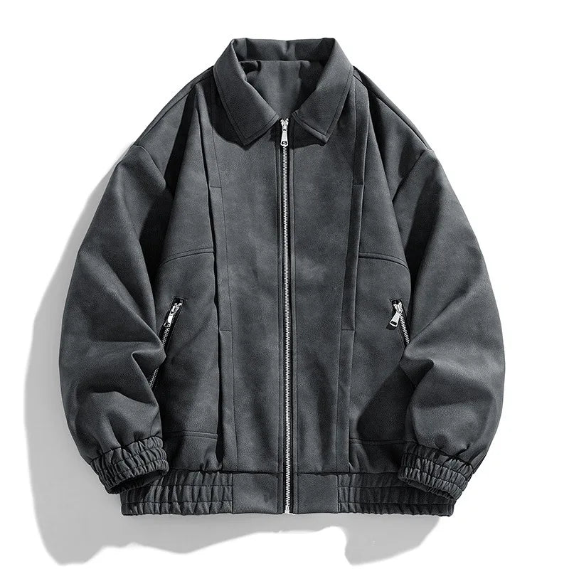 A dark gray suede bomber jacket with a relaxed fit, zip pockets, and ribbed cuffs, shown flat