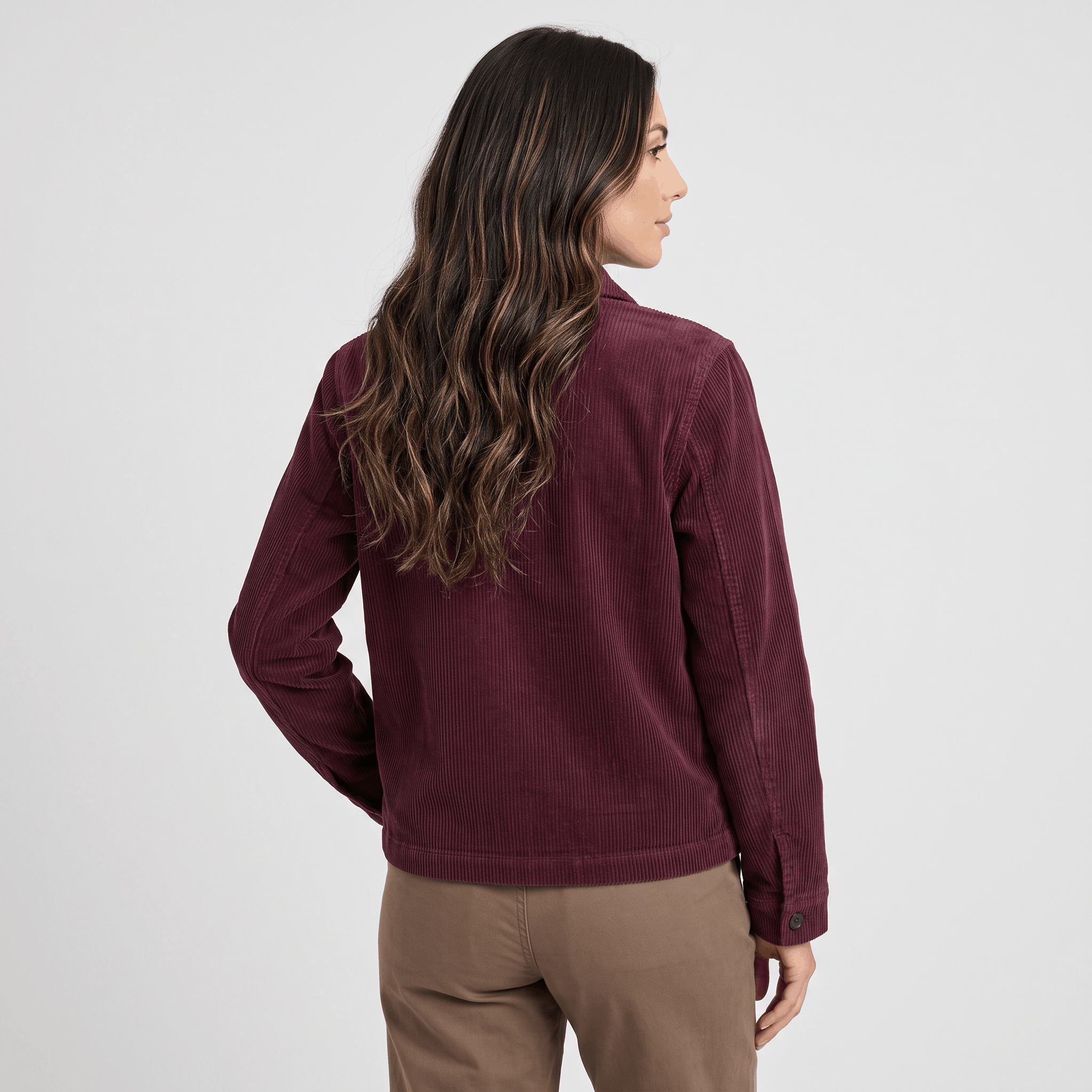 Burgundy wide-wale cotton corduroy chore jacket with a boxy fit and straight hem, seen from the back.