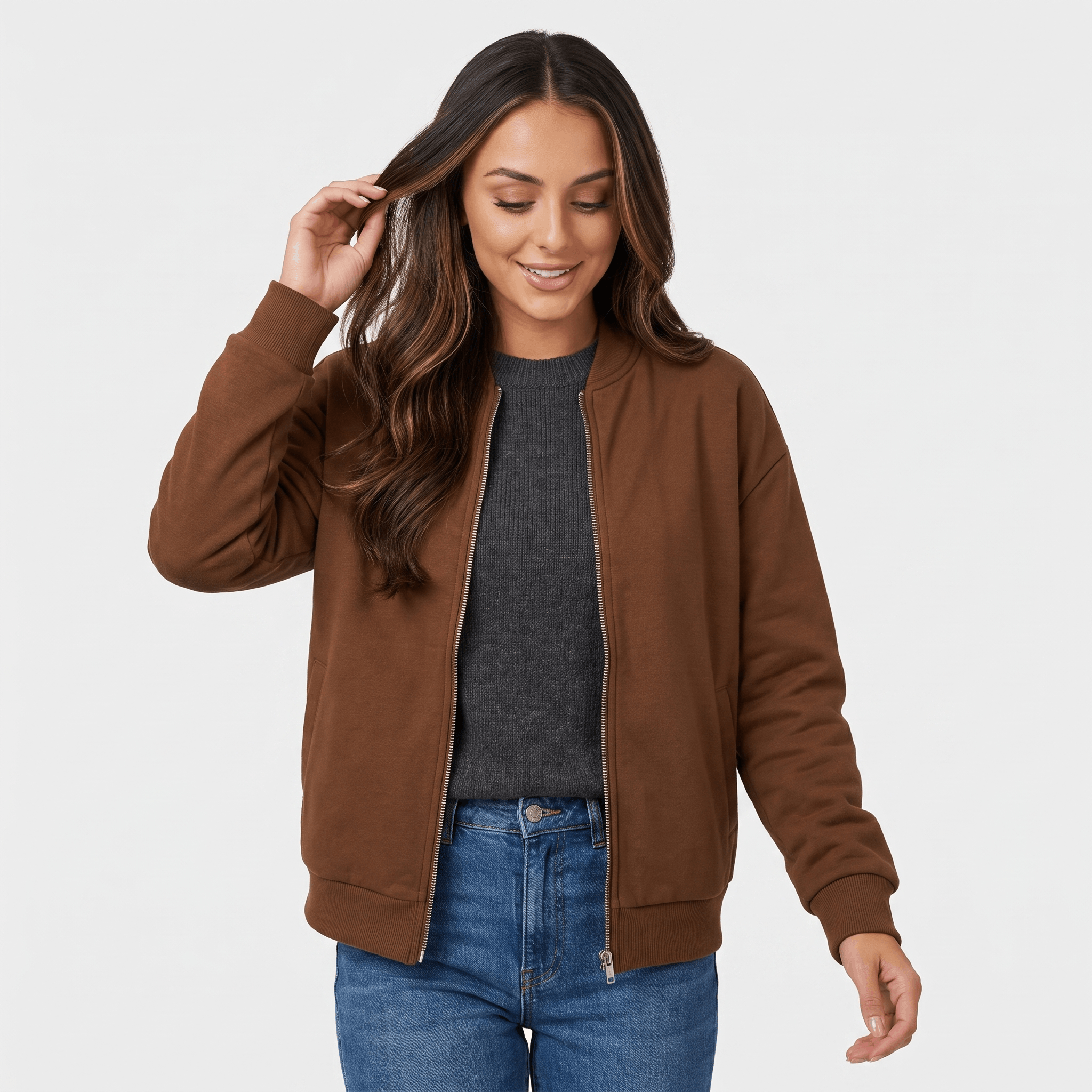 Female model wearing a brown zip-up jacket with a stand collar and side pockets.