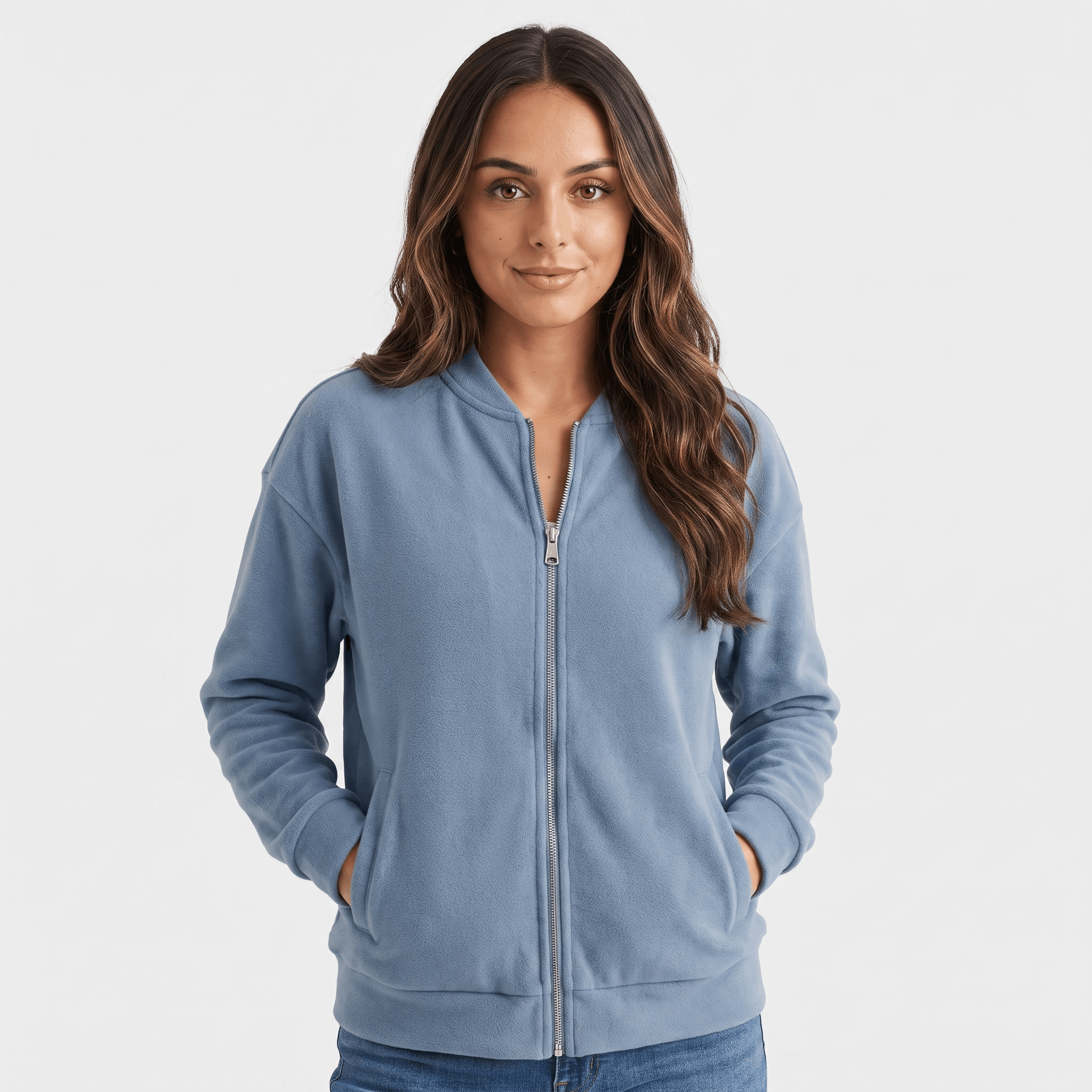 Female model wearing a light blue zip-up jacket with a stand collar, ribbed cuffs and hem, and side pockets.