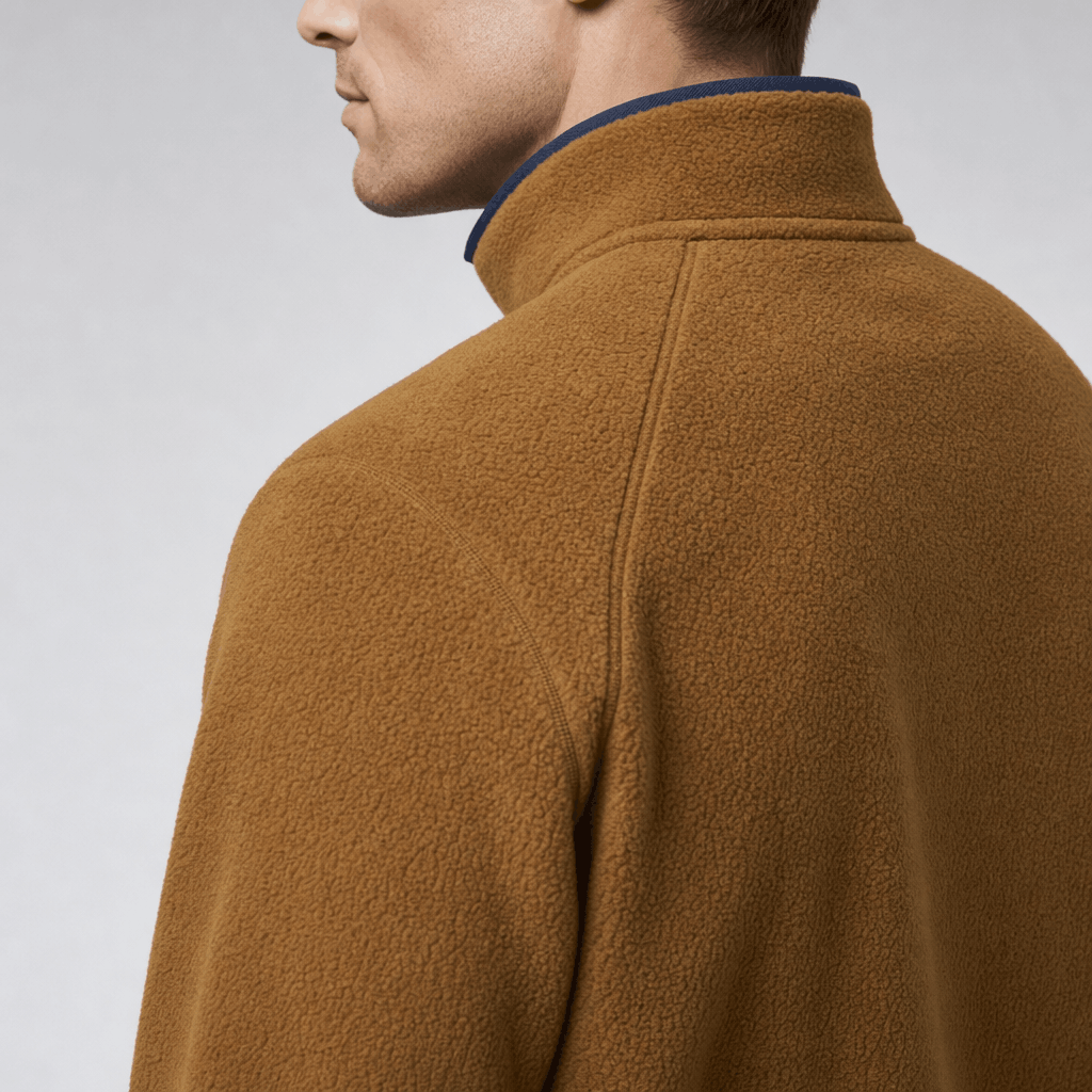 Side and back view of the brown fleece jacket, highlighting the raised stand collar and textured fabric.