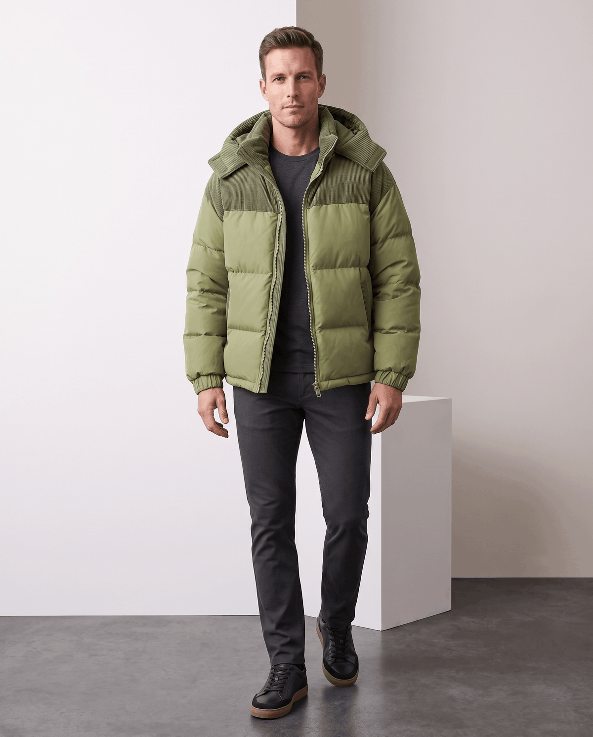 Man wearing green Dravon quilted puffer jacket with trousers, full-length front view