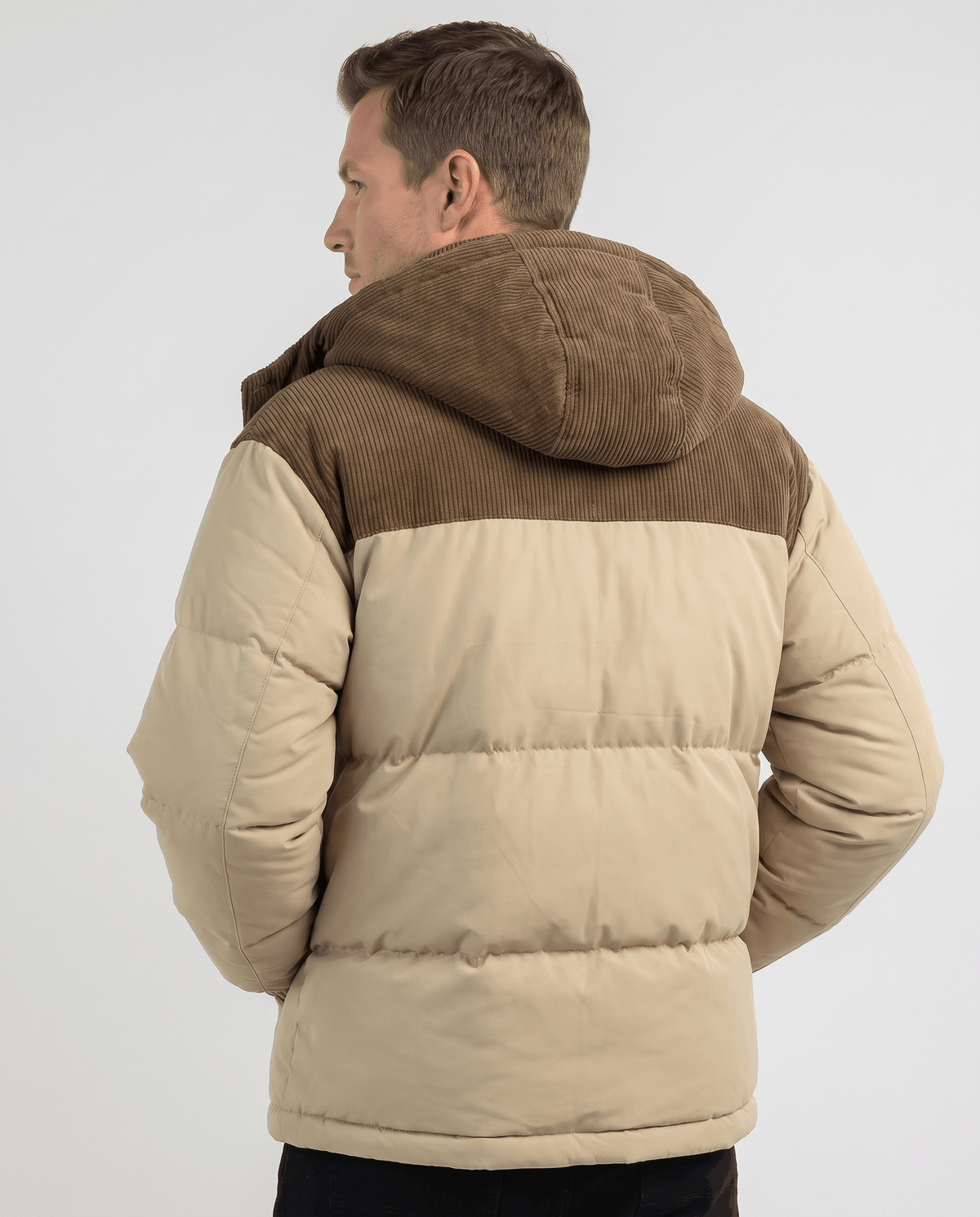 Khaki Dravon quilted puffer jacket back view showing corduroy hood and two-tone design