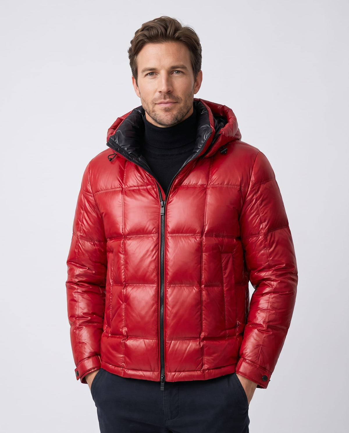 Man wearing red Robin down-filled puffer jacket, front view with hood and zip closure