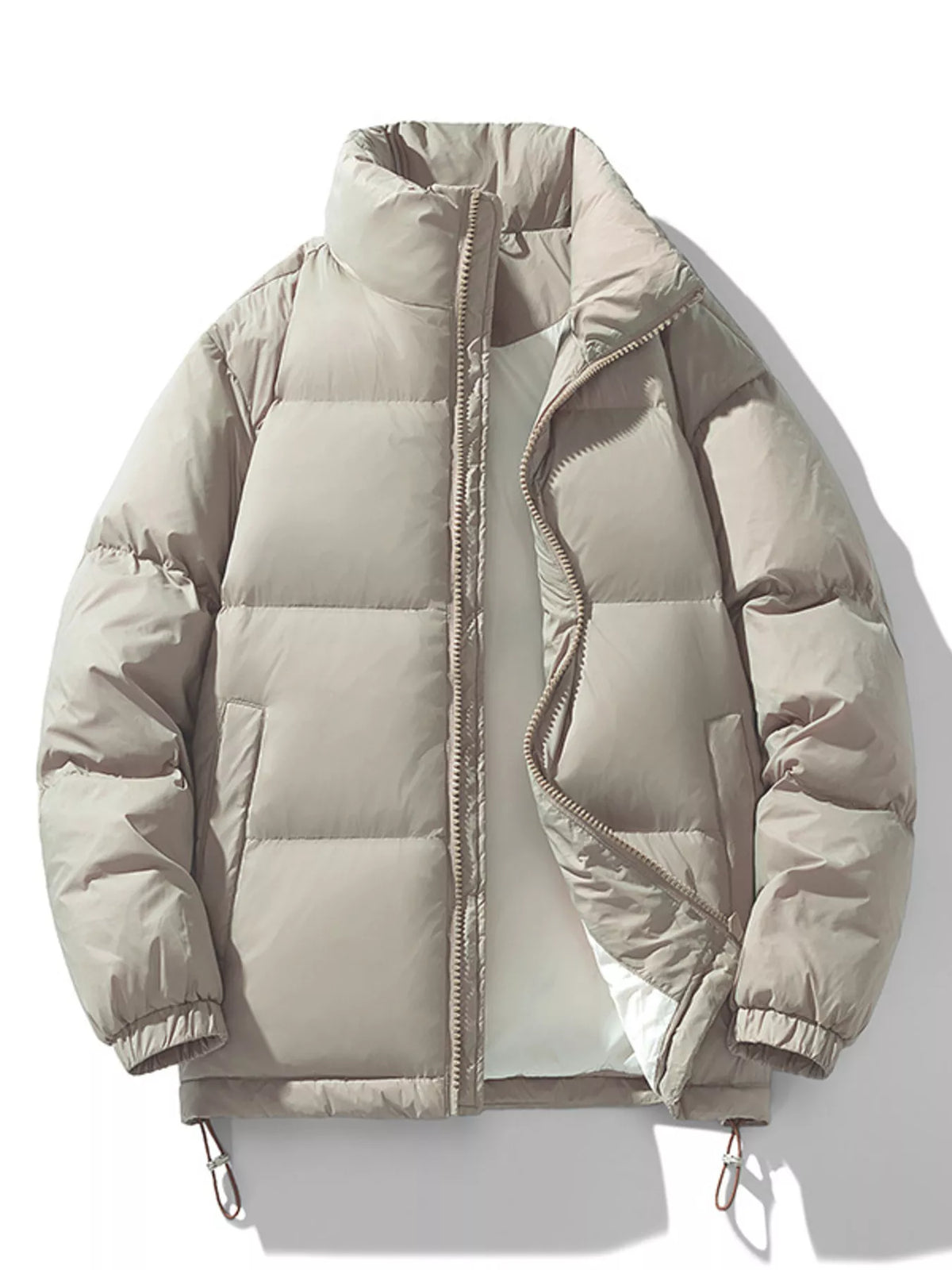 Beige Salvador quilted puffer jacket laid flat and unzipped, front view