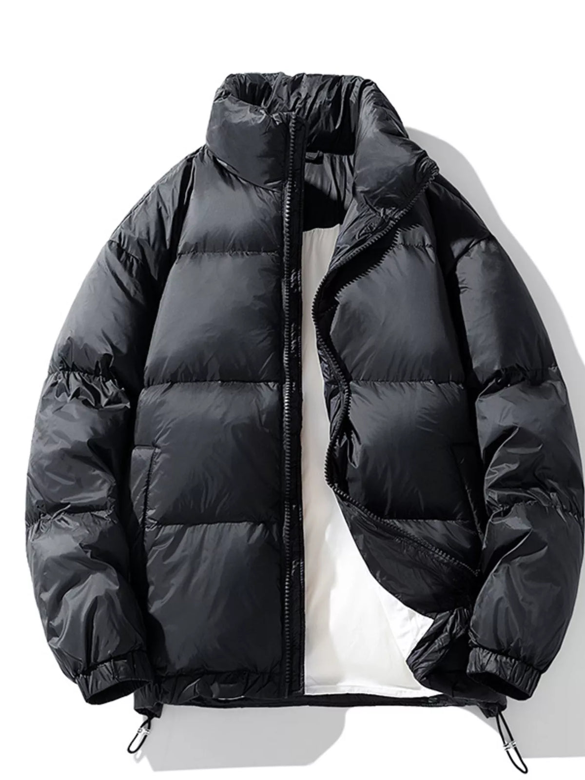 Black Salvador quilted puffer jacket laid flat and unzipped, front view