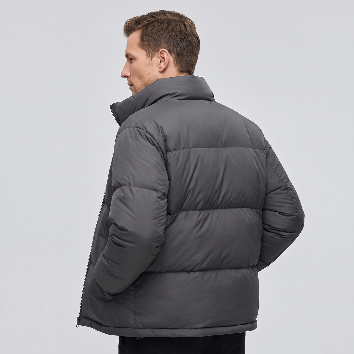 Dark gray Salvador quilted puffer jacket back view showing insulated horizontal panels