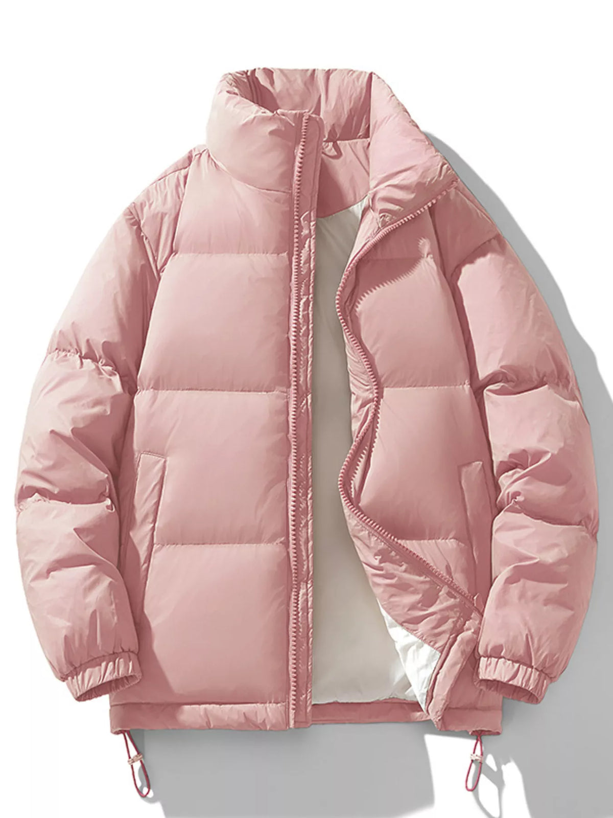 Dusty pink Salvador quilted puffer jacket laid flat and unzipped, front view