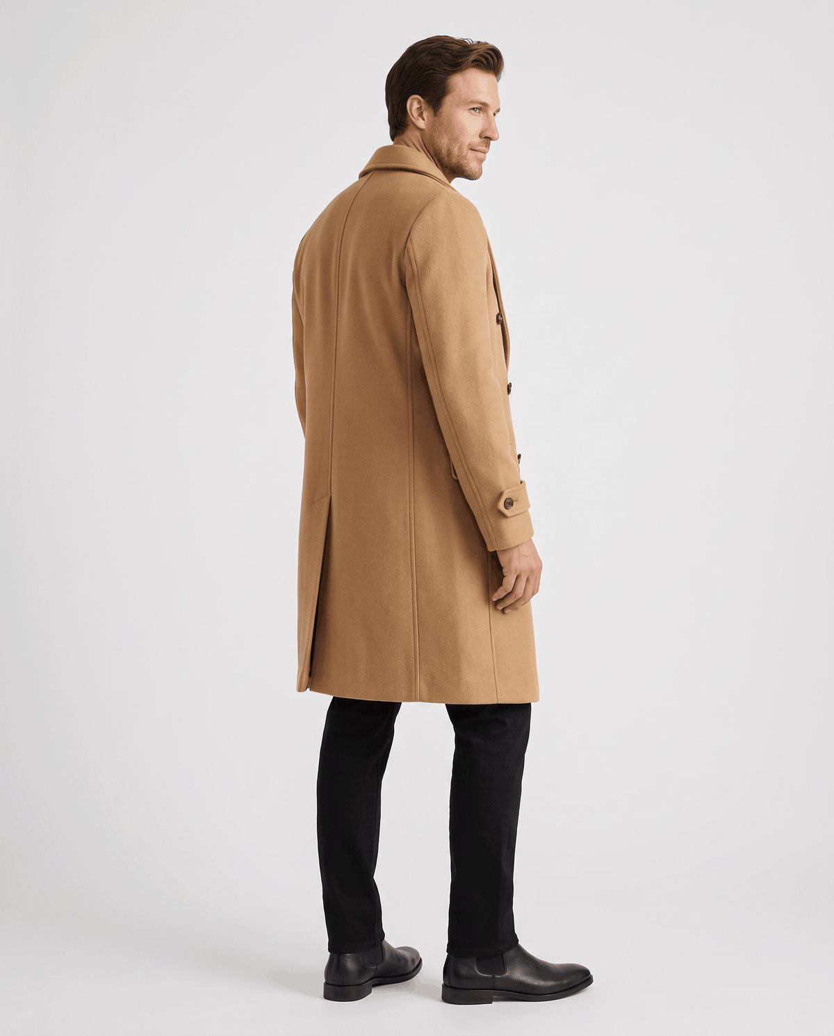 Back view of a long beige wool coat with a clean, structured line