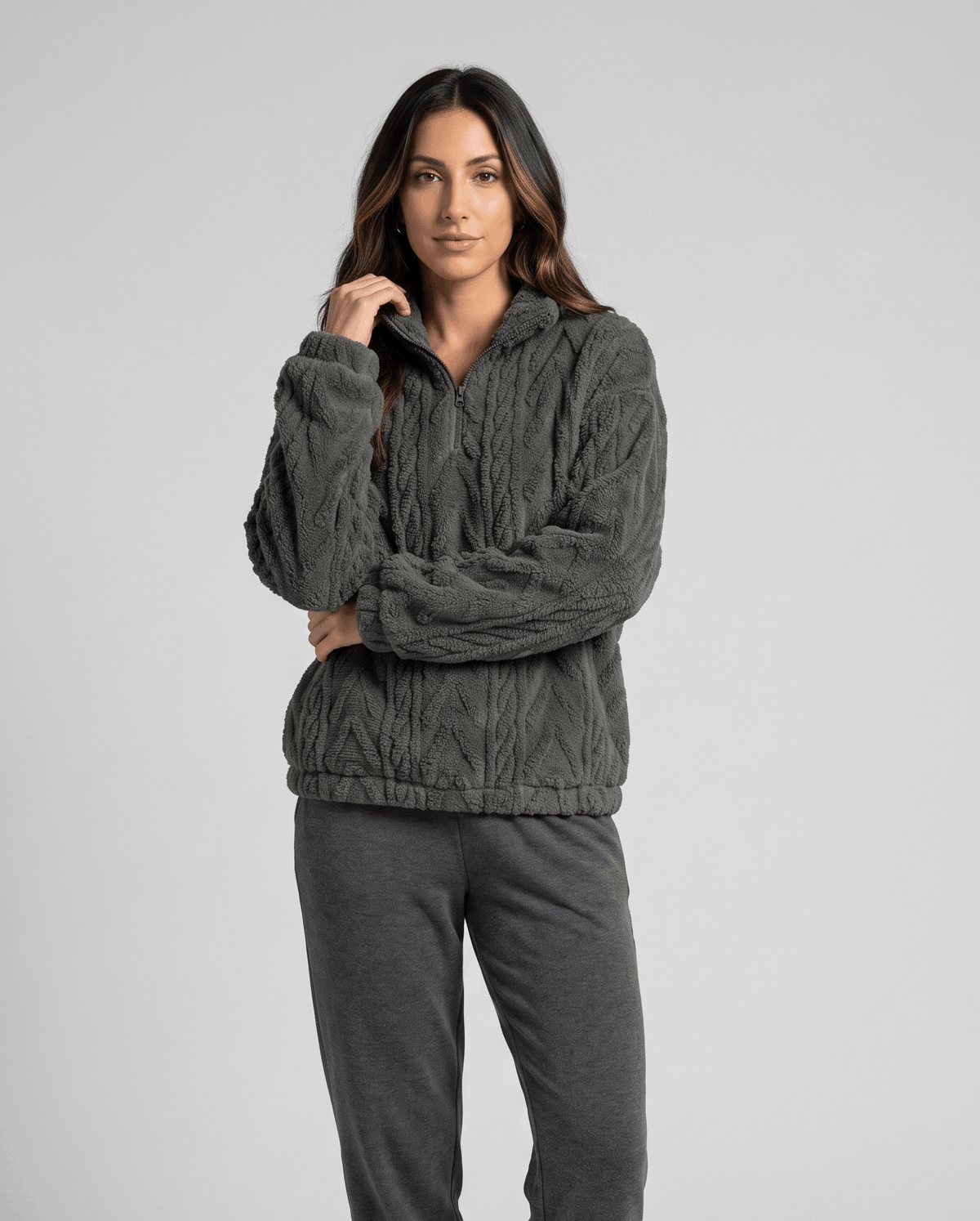Full-length view of dark gray fleece quarter-zip with matching gray joggers