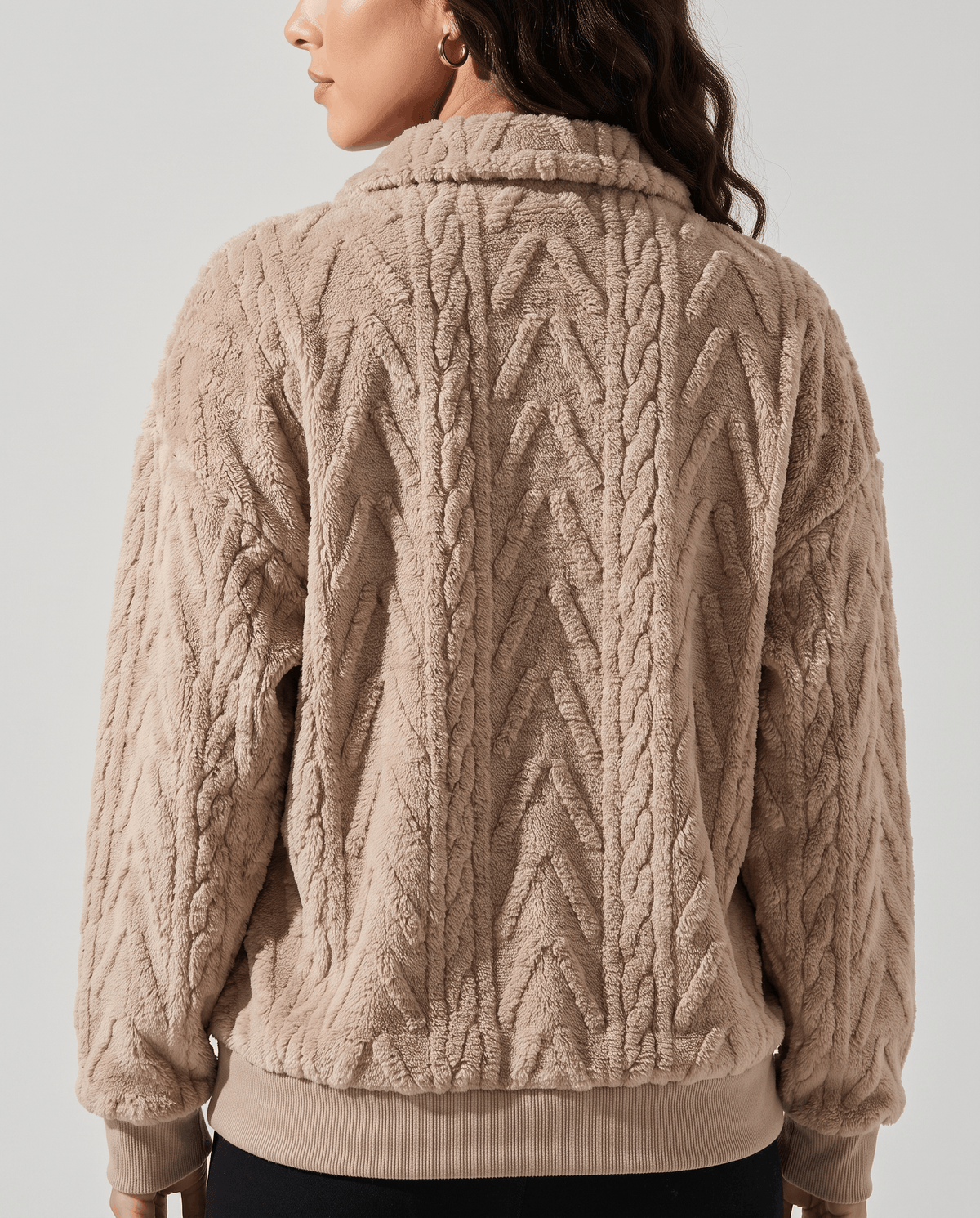 Back view of khaki cable fleece pullover with ribbed banded hem