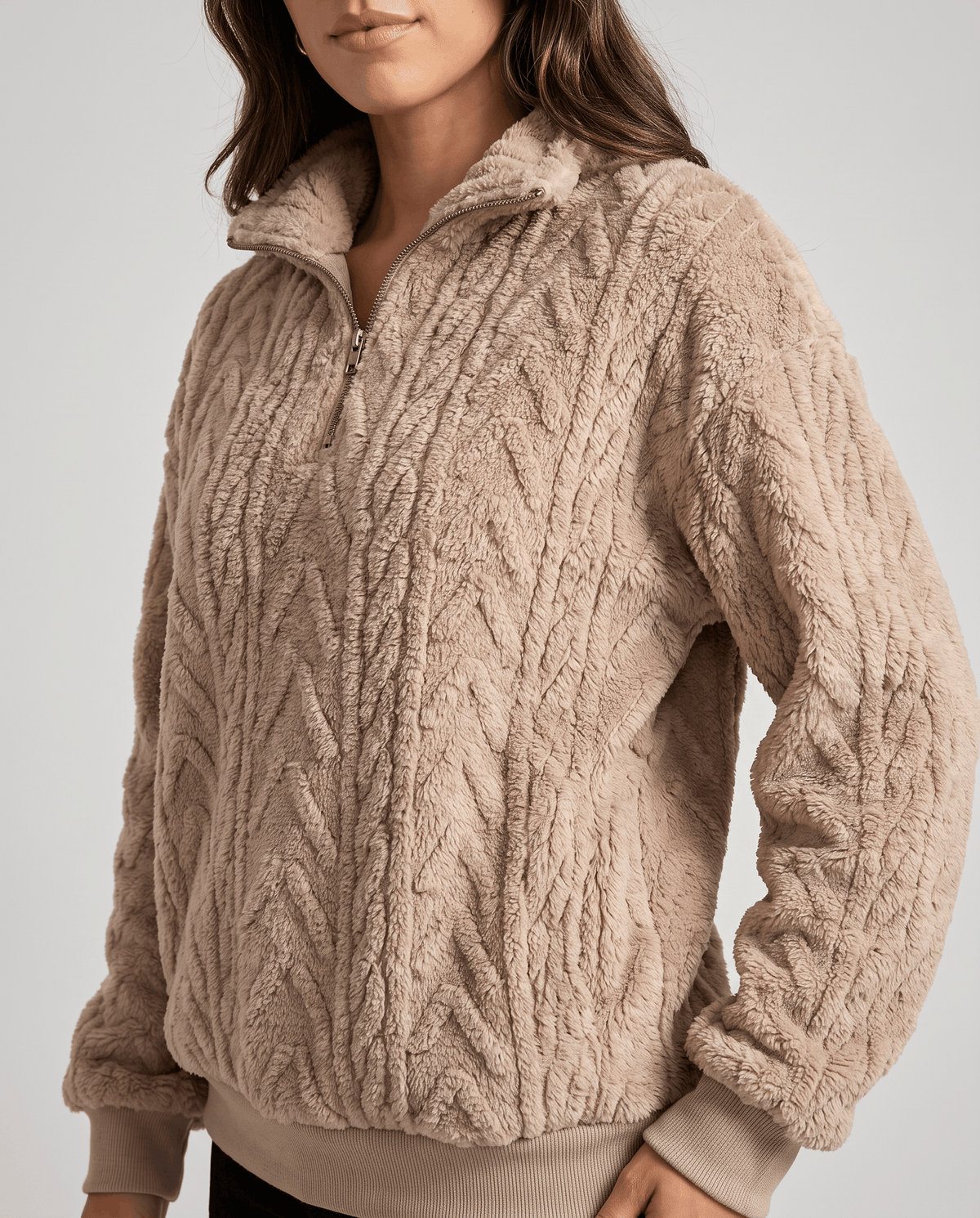 Cropped front view of khaki plush quarter-zip with open collar